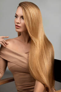 Woman with long blonde hair extensions